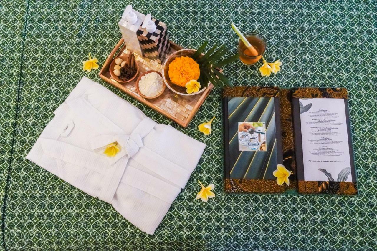 Furamaxclusive Ocean Beach Seminyak Bali Legian  Exterior photo A spa treatment at the Four Seasons Hotel, Bangkok